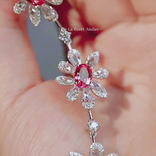 Lab padparadscha sapphire floral bracelet with marquise petal setting in silver finish








