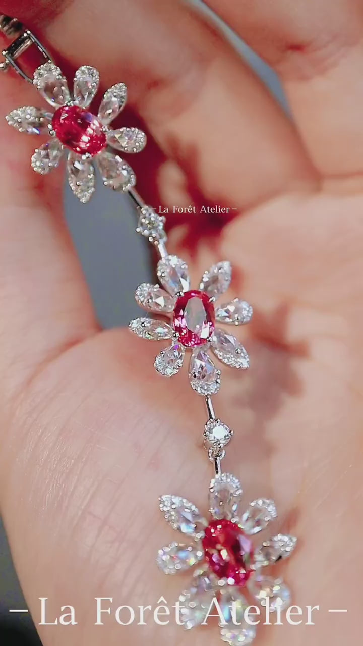 Lab padparadscha sapphire floral bracelet with marquise petal setting in silver finish








