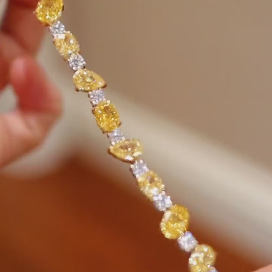 Charisse bracelet with lab-grown yellow diamonds and white diamond accents in pear and oval shapes








