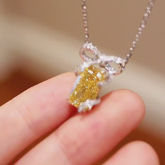 Radiant-cut 3.5ct yellow lab-grown diamond necklace with diamond bow setting








