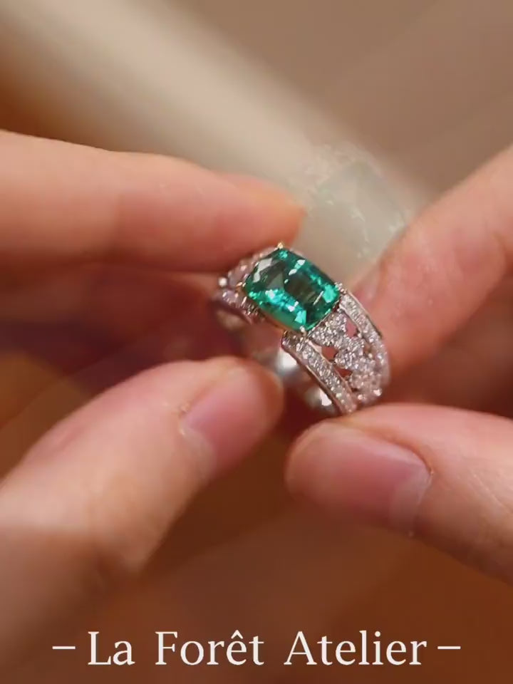 Bold lab-grown emerald ring with cushion-cut 2ct stone and pavé diamond split band








