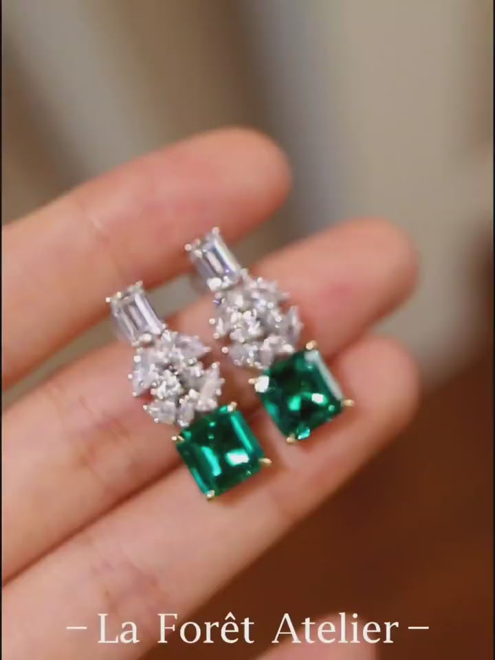 Naelis drop earrings with 2.5ct lab emeralds and lab diamond clusters in white gold








