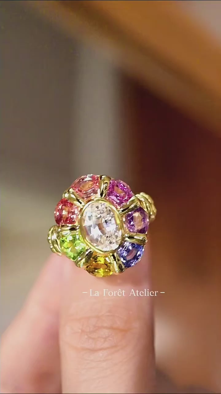 Zariel flower ring with rainbow color sapphires and diamond set in gold