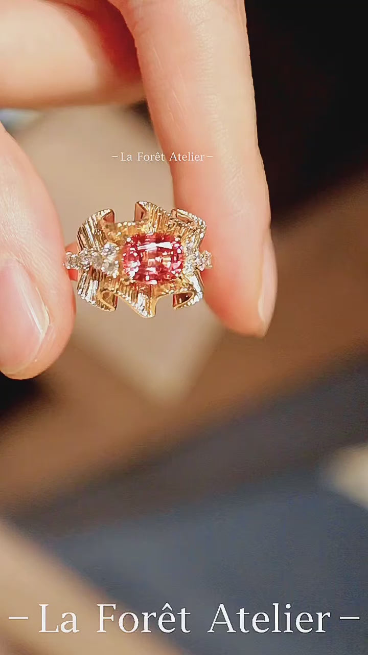 Lab sapphire ring with flowing gold design and diamond accents

