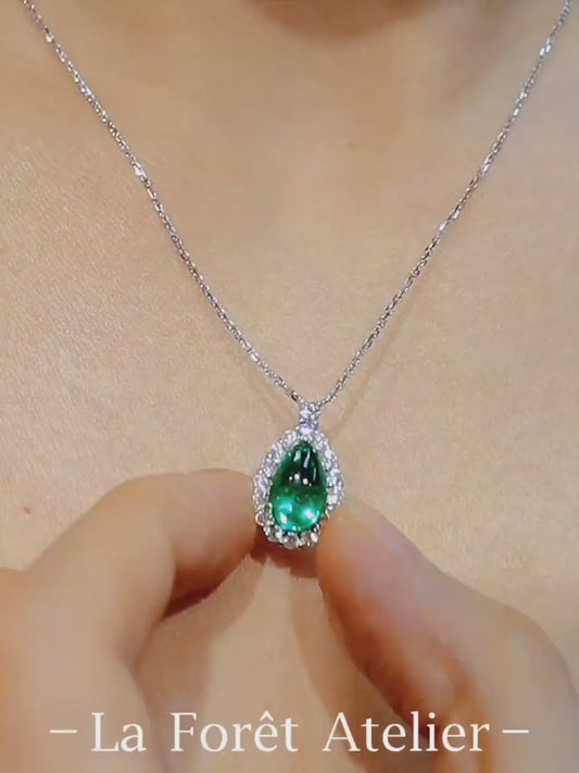 Teardrop pendant necklace with 2ct lab-grown emerald and diamond halo on white gold chain








