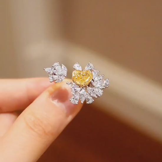 Lirael floral white gold ring with heart-shaped yellow diamond and white diamond halo








