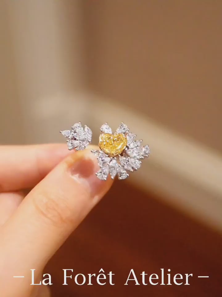 Lirael floral white gold ring with heart-shaped yellow diamond and white diamond halo








