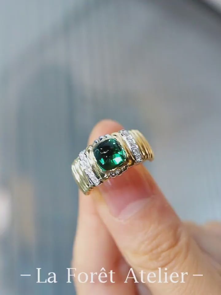Bold gold ring with 1.8ct lab-grown sugarloaf emerald and diamond accents








