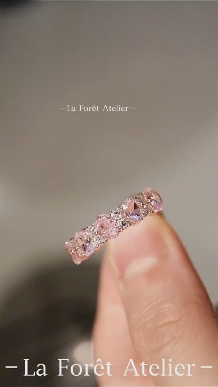 Aureline rose gold ring with alternating lab pink and white diamonds in an eternity style








