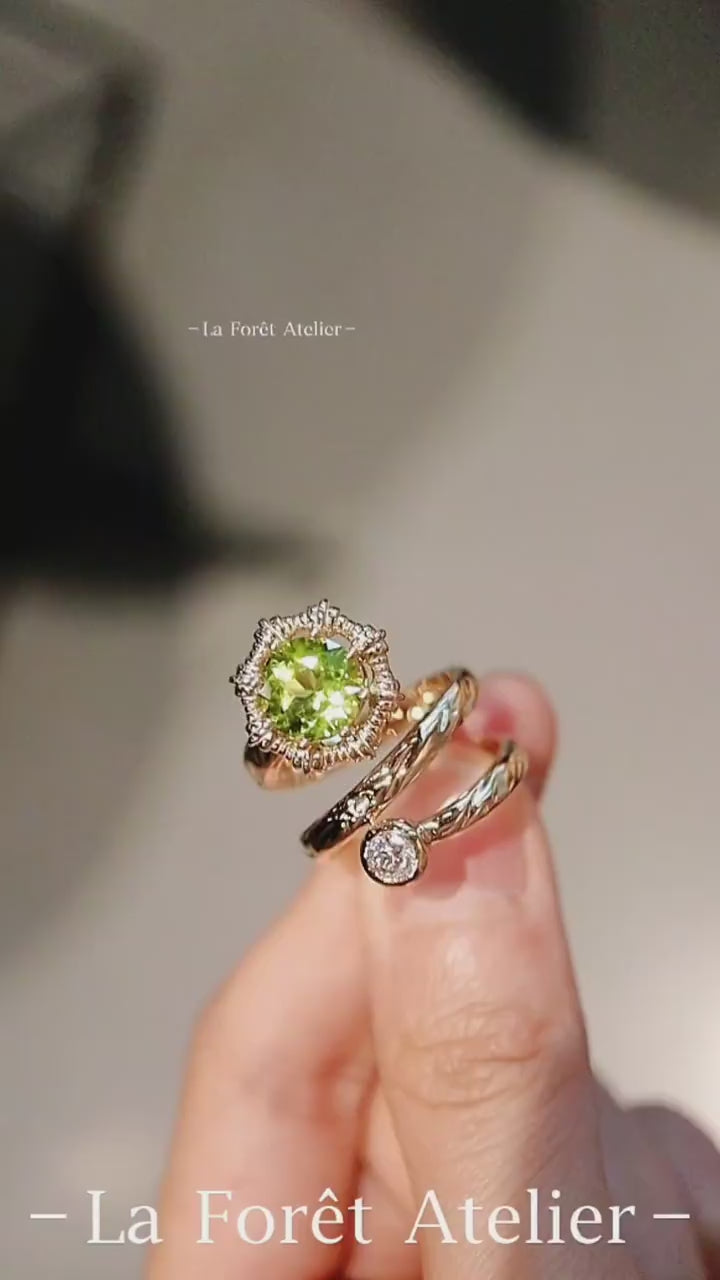 Natural peridot ring with modern twist and diamond accent









