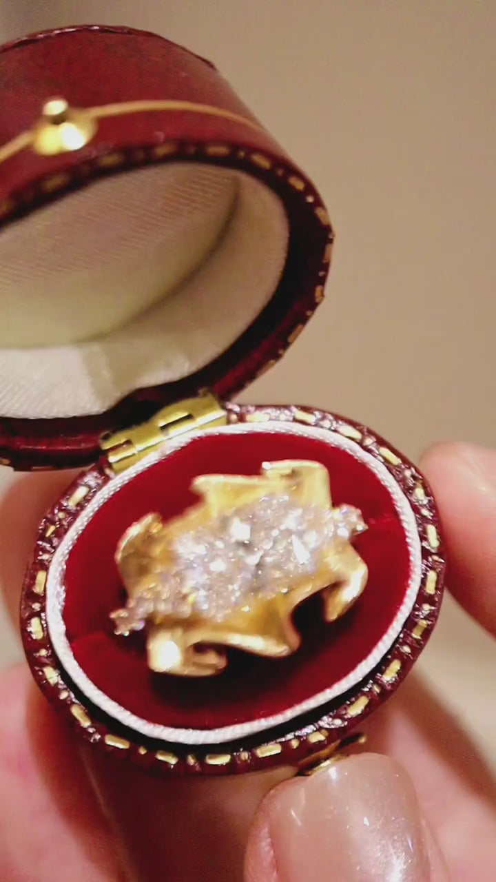 Floren ring featuring a 2ct lab-grown diamond in a sculpted gold floral design








