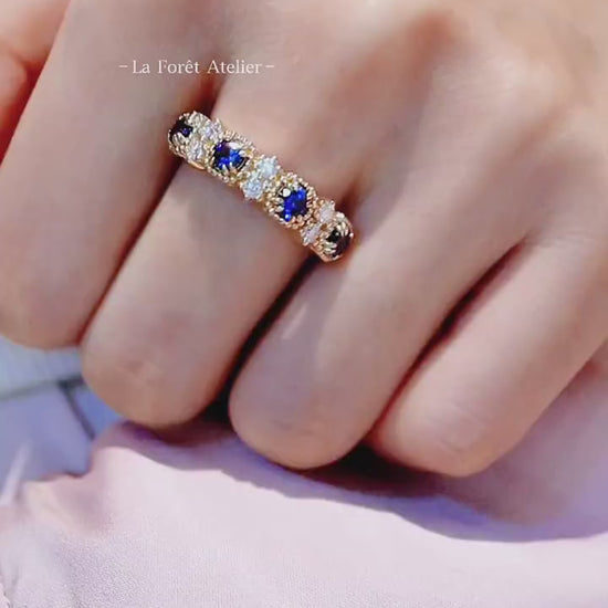 Half eternity band with blue sapphires and lab diamonds in solid gold








