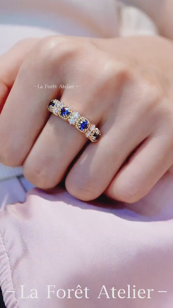 Half eternity band with blue sapphires and lab diamonds in solid gold








