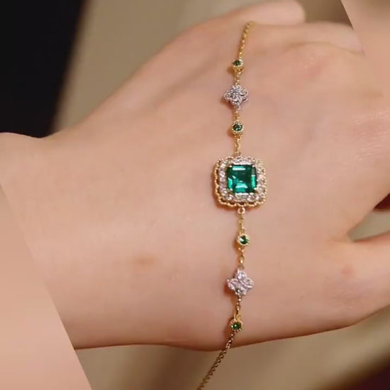 Lymera bracelet with 1.2ct lab grown emerald and diamond accents on a gold chain








