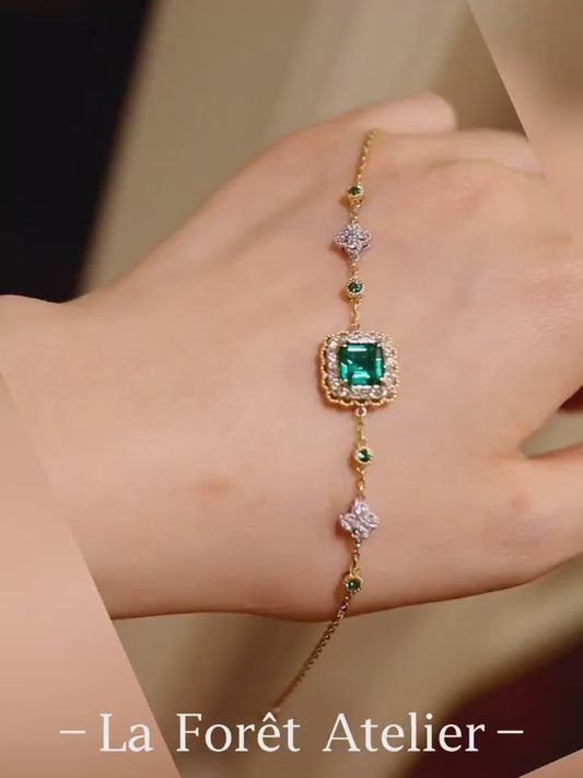 Lymera bracelet with 1.2ct lab grown emerald and diamond accents on a gold chain








