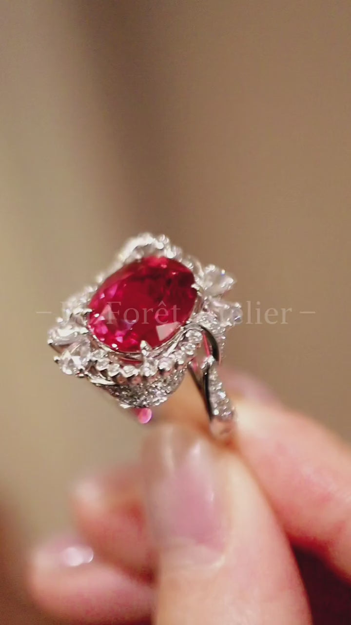 Solmira ring showcasing a 7ct lab-grown ruby with a halo of lab diamonds