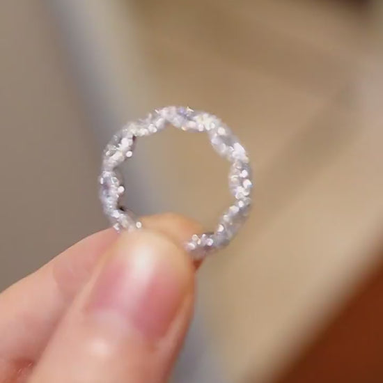 Oval lab-grown diamond eternity band with scalloped setting design








