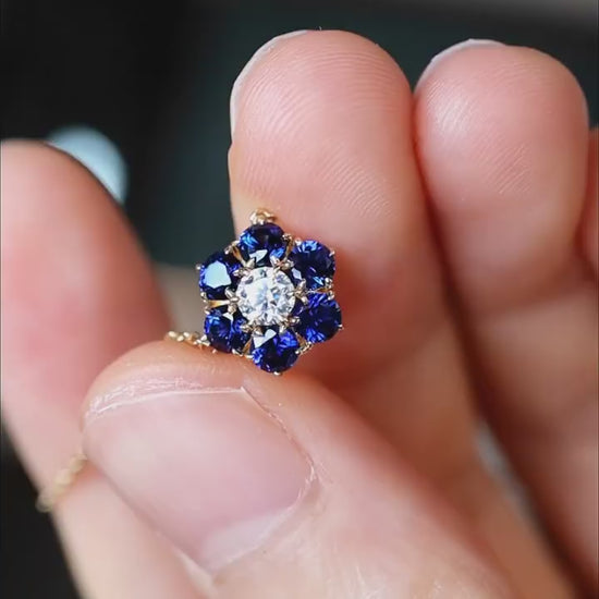 Gold flower necklace with lab diamond and blue sapphires in 18k gold setting








