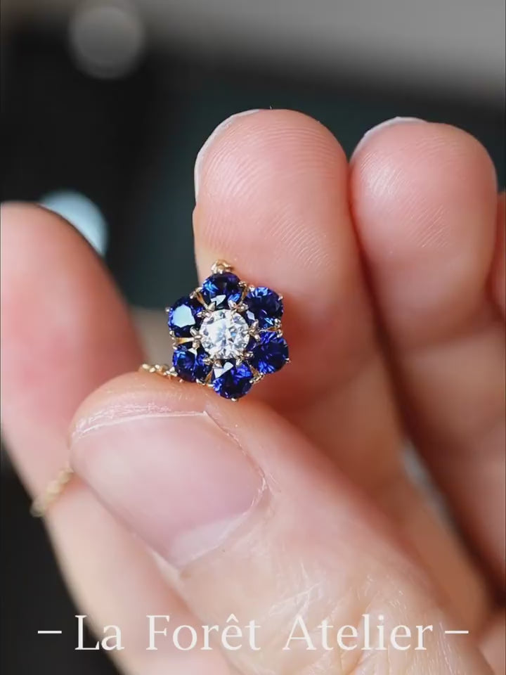 Gold flower necklace with lab diamond and blue sapphires in 18k gold setting








