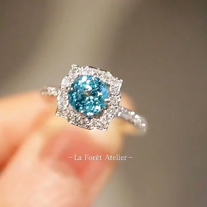 Azure Bloom Round Paraiba Halo Ring