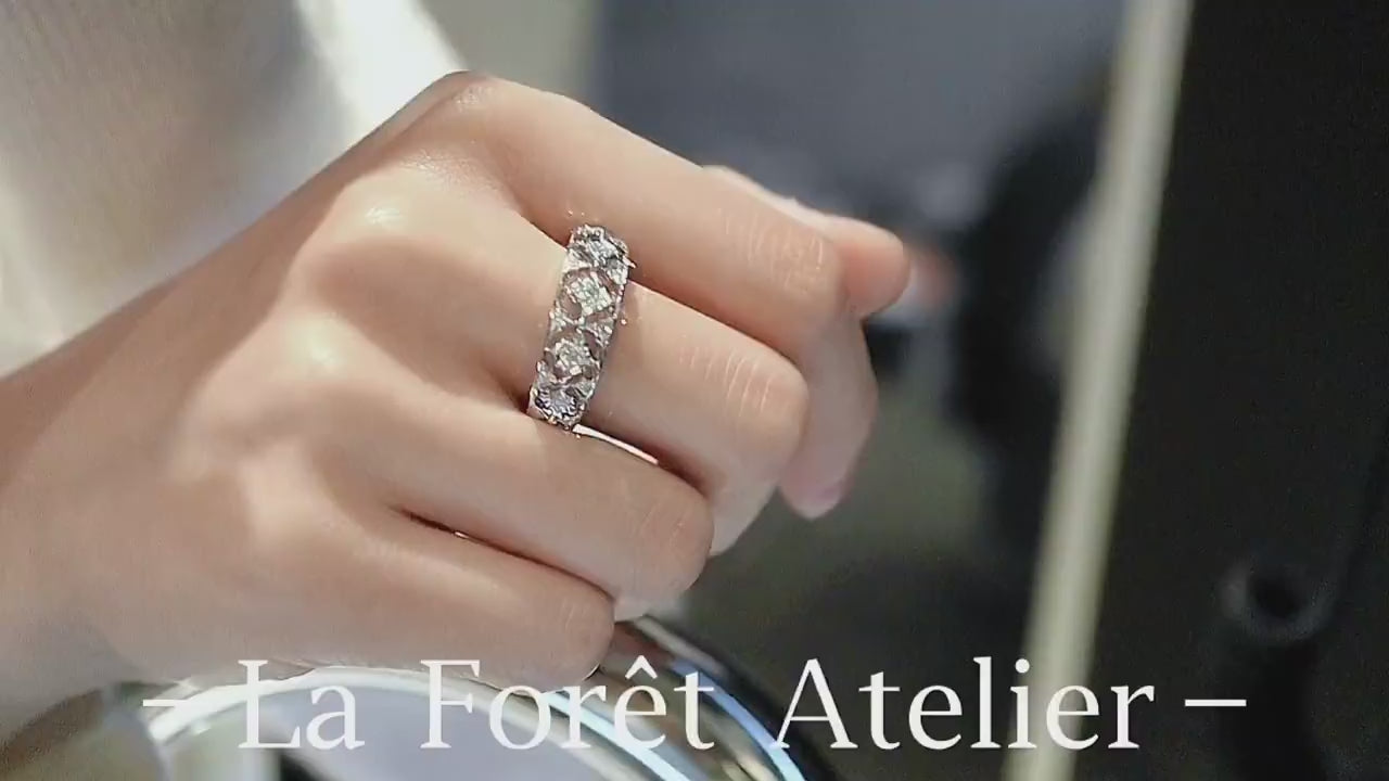 Half eternity diamond band with vintage floral filigree design in white gold








