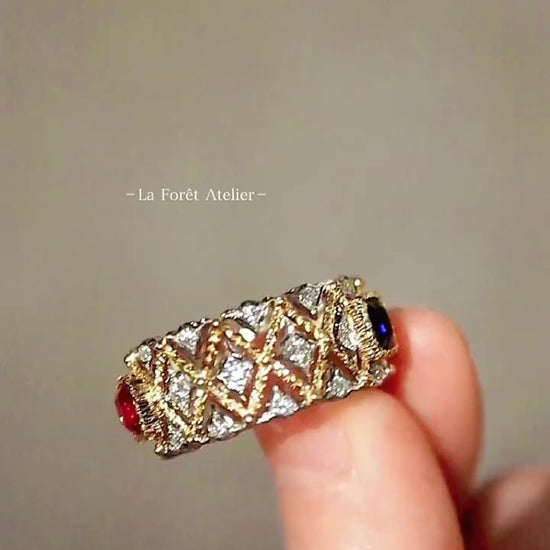Lattice band ring featuring pink and white sapphires
