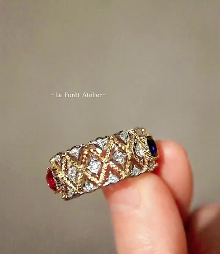 Lattice band ring featuring pink and white sapphires
