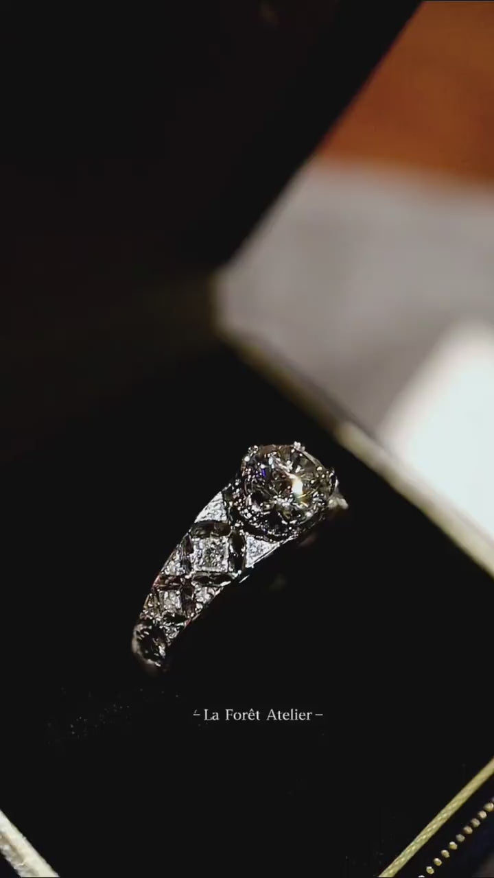 Kalindra ring with 1.5ct lab-grown diamond, floral halo, and vintage-inspired band in white gold – elegant sustainable engagement ring

