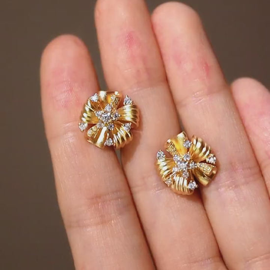 Vintage floral earrings with twisted gold ribbons and lab-grown diamond centers

