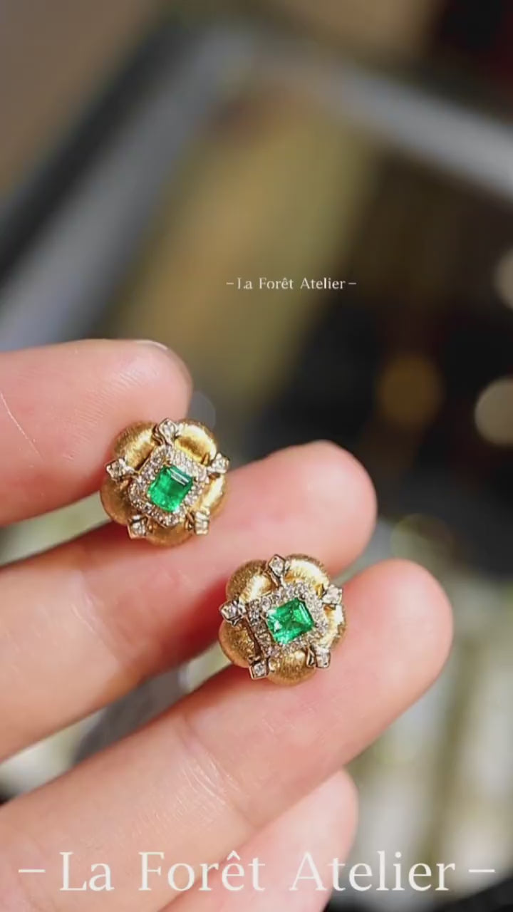 Vintage gold stud earrings with lab emerald centers and diamond accents








