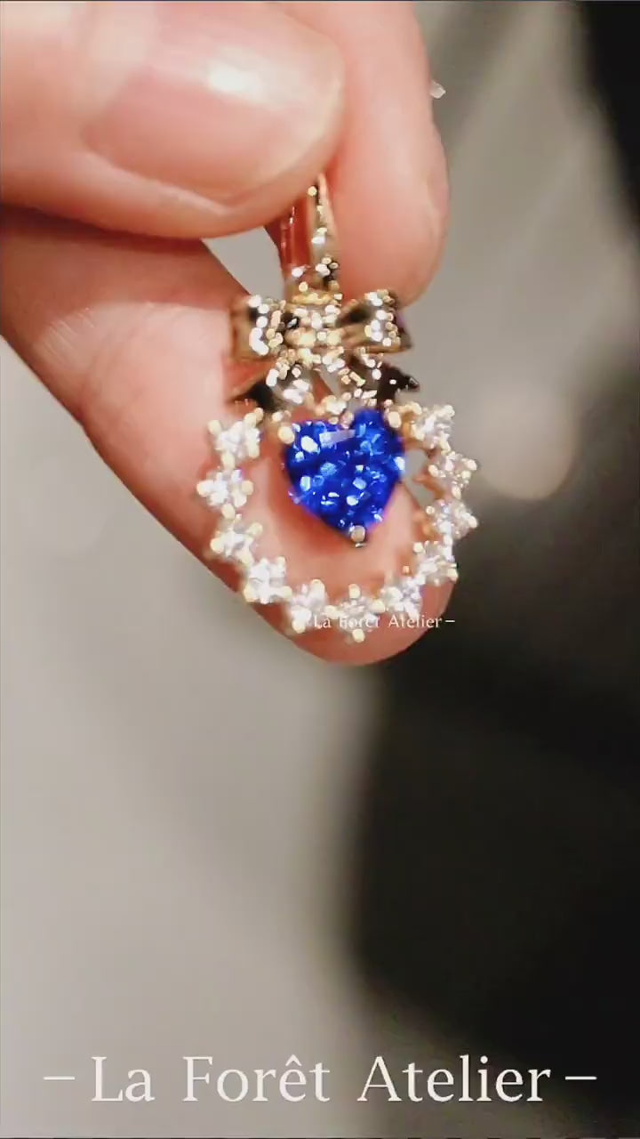 Lab sapphire necklace with diamond circle design

