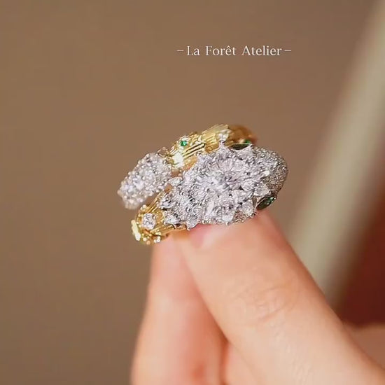 Close-up of lab diamond serpent ring with coiled design and gemstone detailing