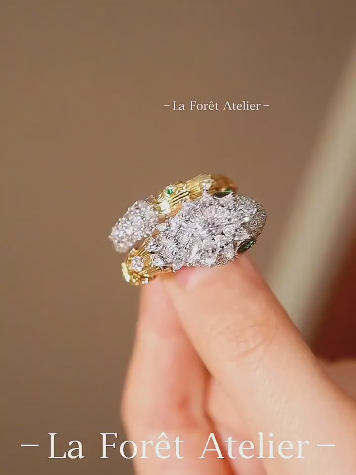 Close-up of lab diamond serpent ring with coiled design and gemstone detailing